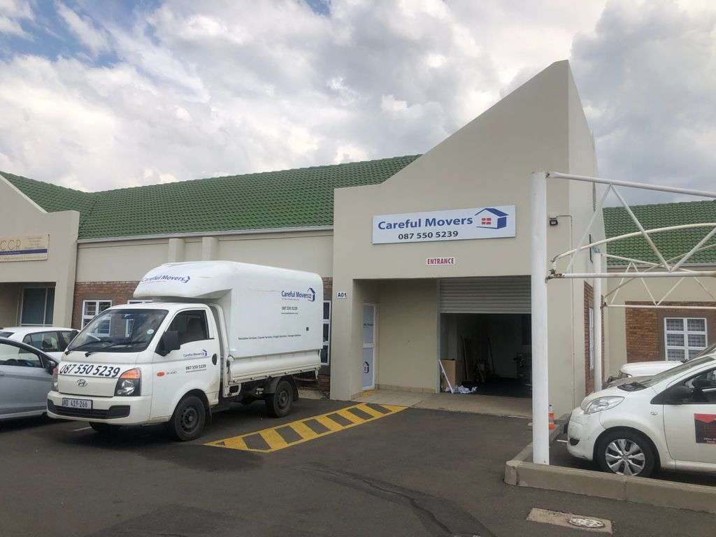 Careful Movers truck parked at the branded warehouse and storage entrance in Randburg